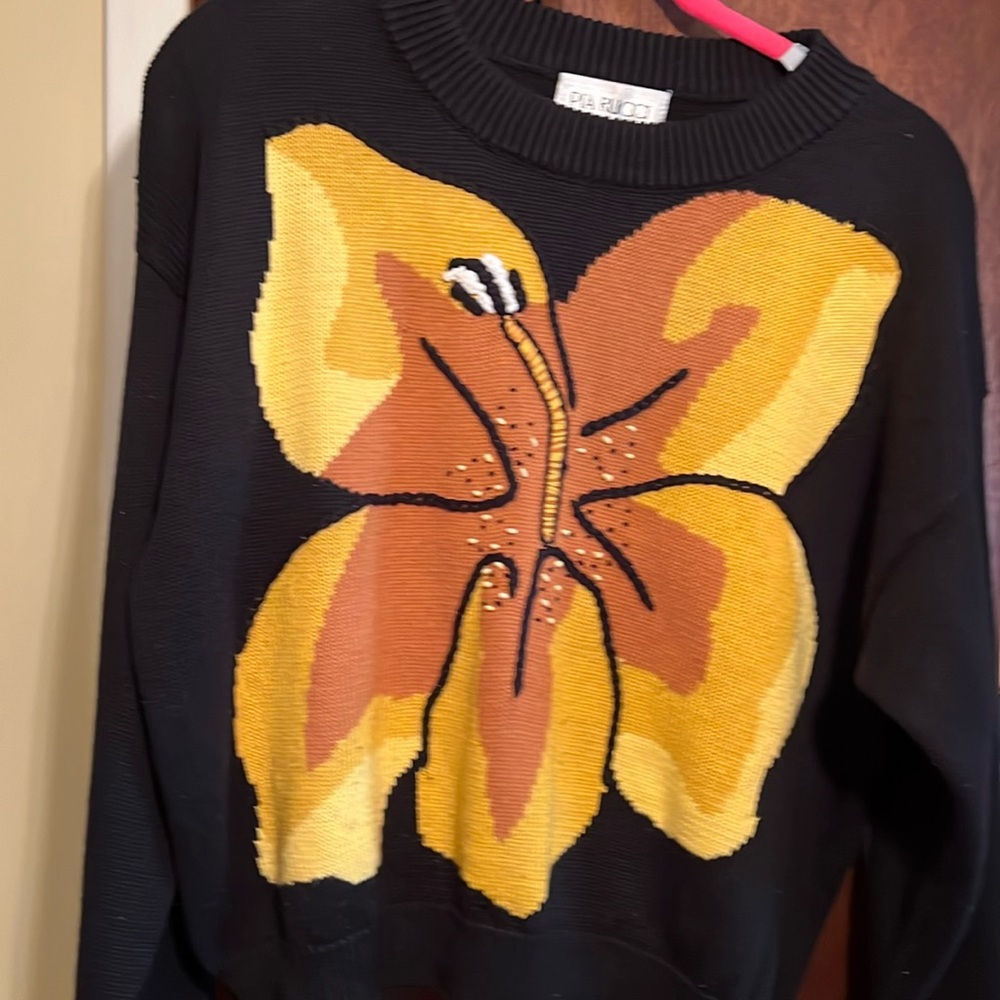This is a black butterfly, Pia  Rucci sweater large used vintage